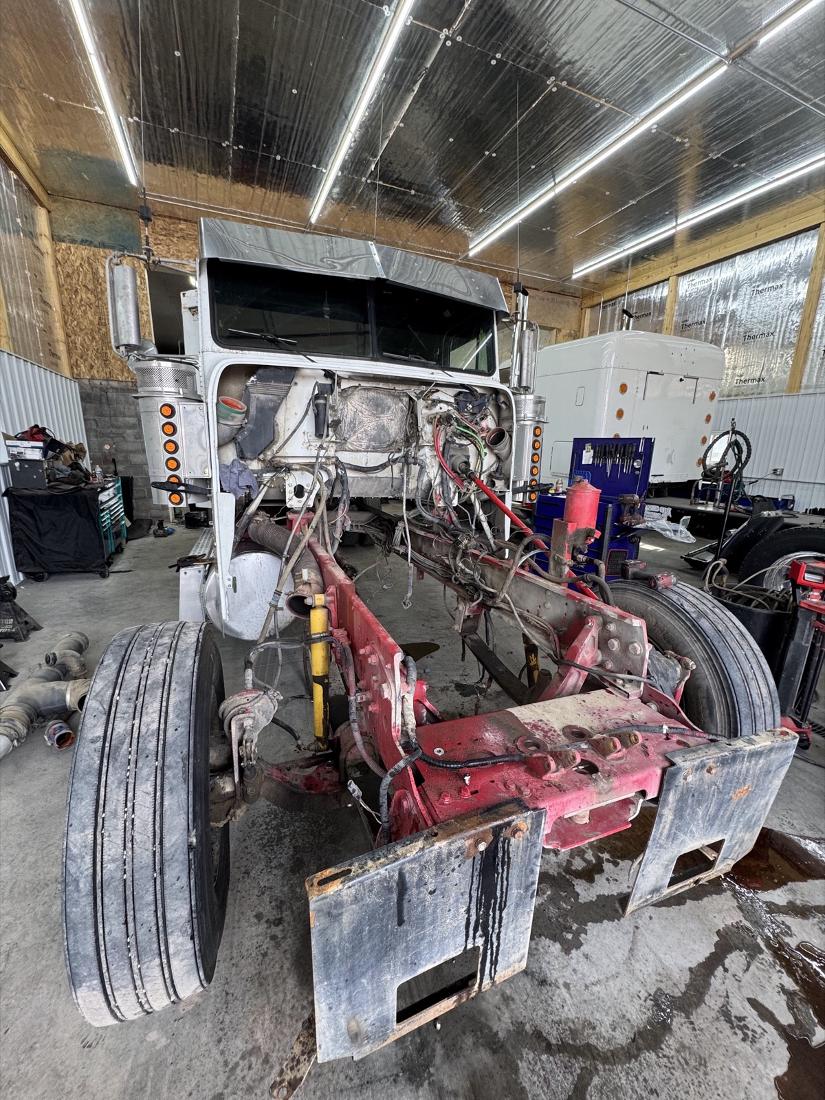Truck cab mid-rebuild on the floor
