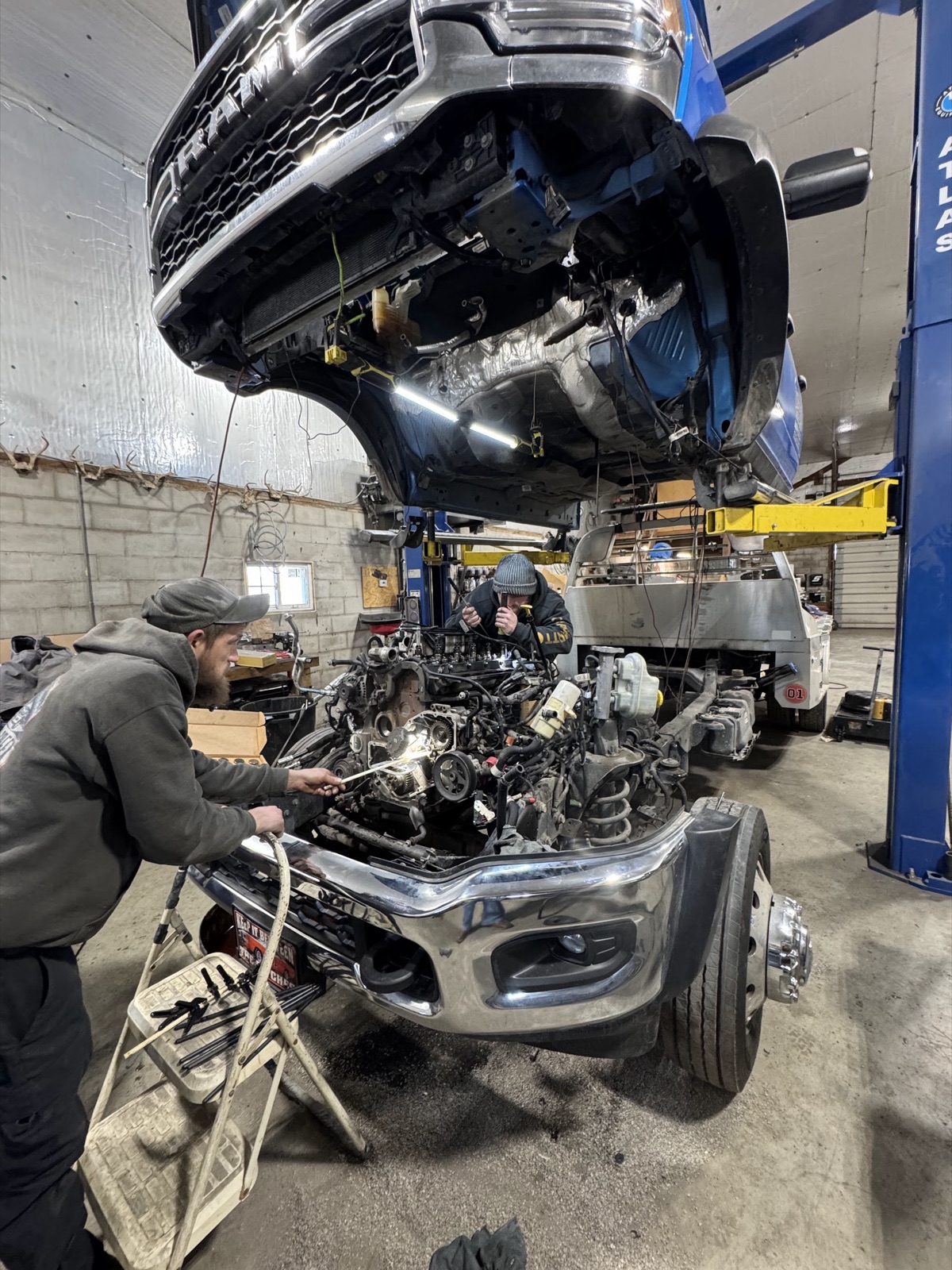 Diesel mechanic at work in the Twisted Creek Diesel shop