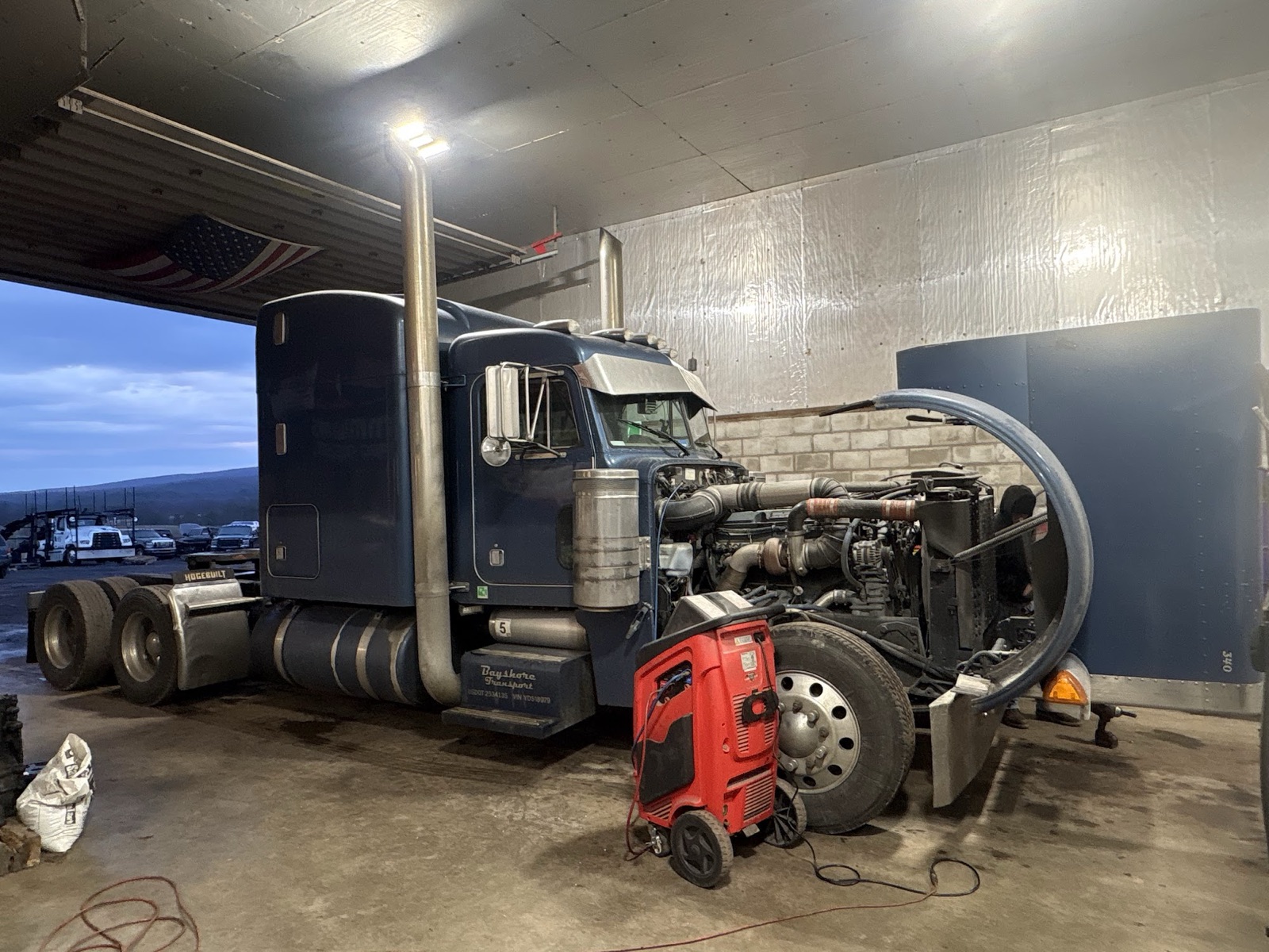 Black Peterbilt in the shop bay